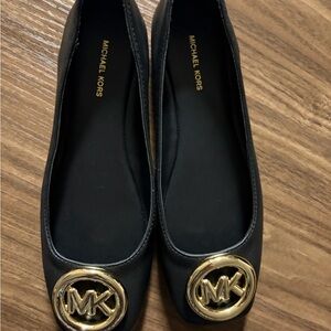 Michael Kors Black Leather Ballet Flats with Gold MK Medallion